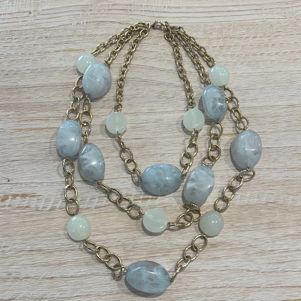 Gold and various shades of light blue necklace